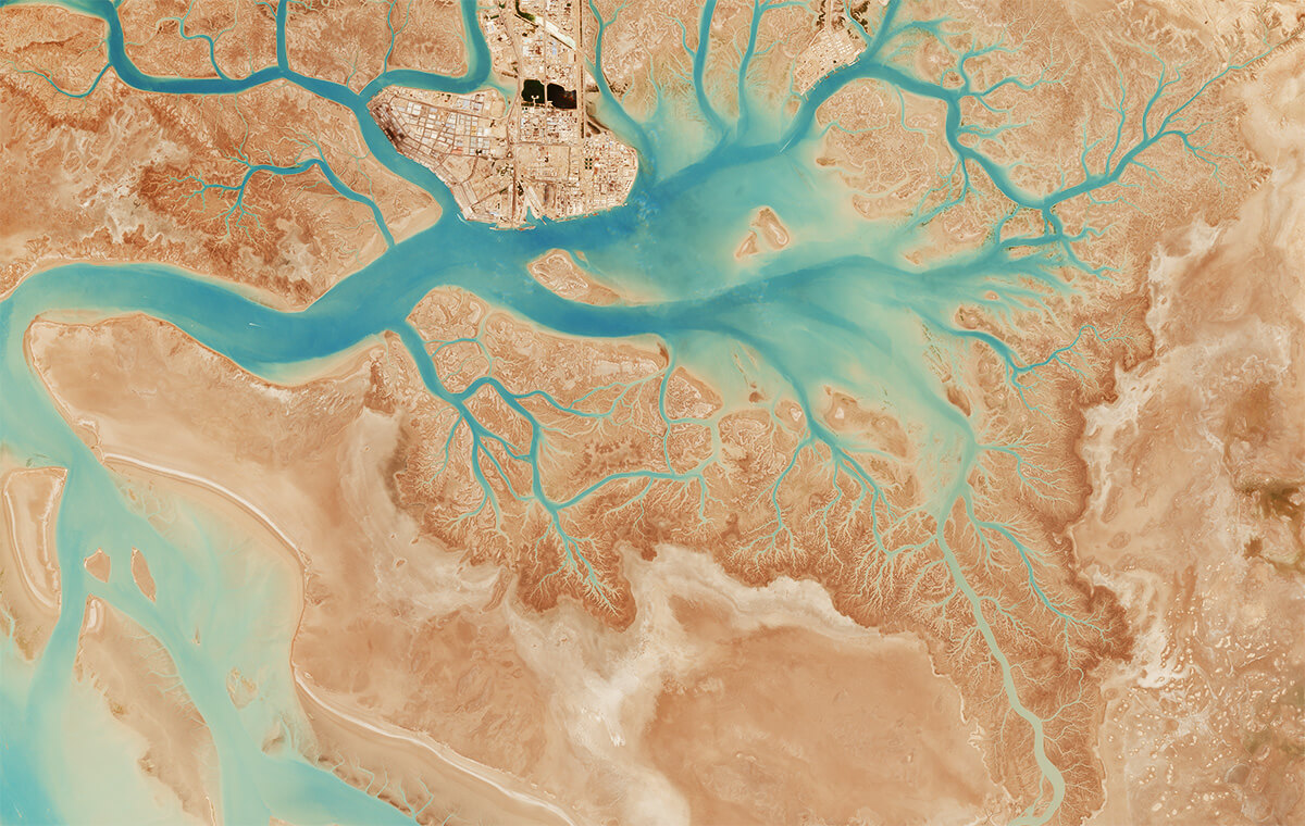 A river-like water body seen from above in a desertic region